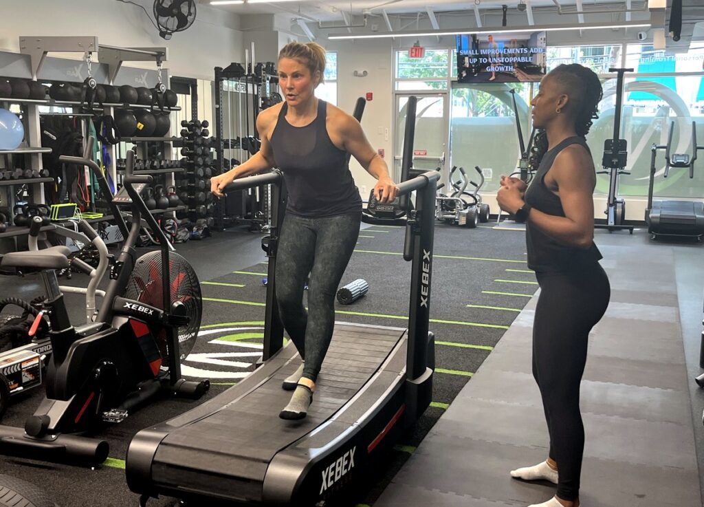 Women training on treadmill